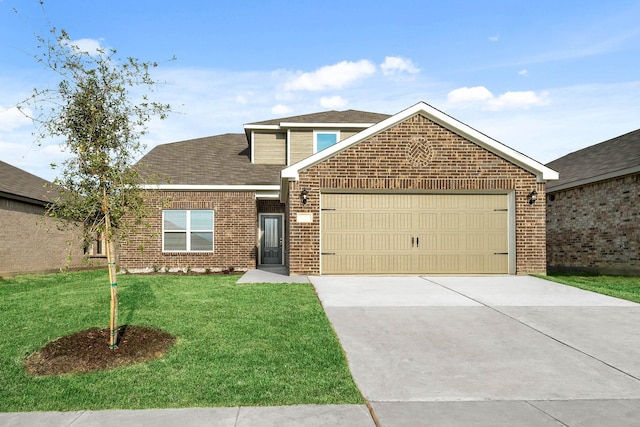 view of front of property featuring a front lawn and a garage