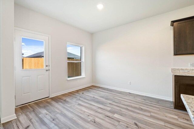 interior space with light hardwood / wood-style floors