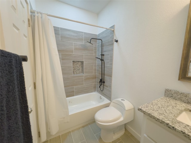 full bathroom featuring vanity, shower / bath combo, and toilet