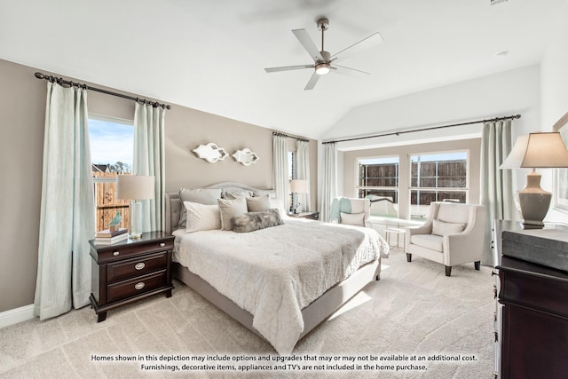 bedroom featuring ceiling fan, light carpet, and lofted ceiling