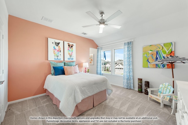 bedroom with ceiling fan, light colored carpet, and lofted ceiling