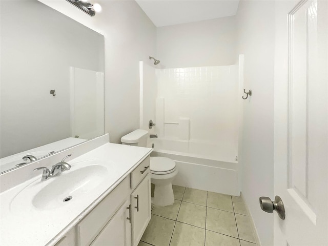 full bathroom featuring tile patterned floors, vanity, toilet, and bathtub / shower combination