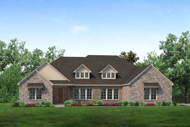 view of front facade featuring brick siding and a front lawn