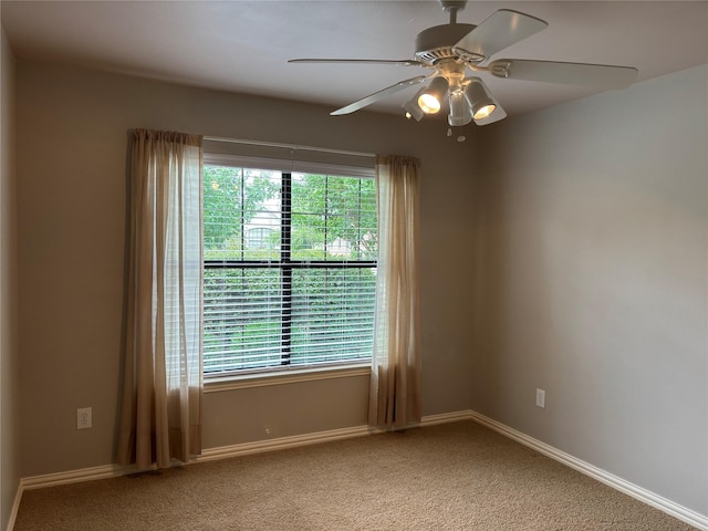 10104 Southpoint Ct, Denton, TX 76207 - unfurnished room with baseboards, light colored carpet, and ceiling fan