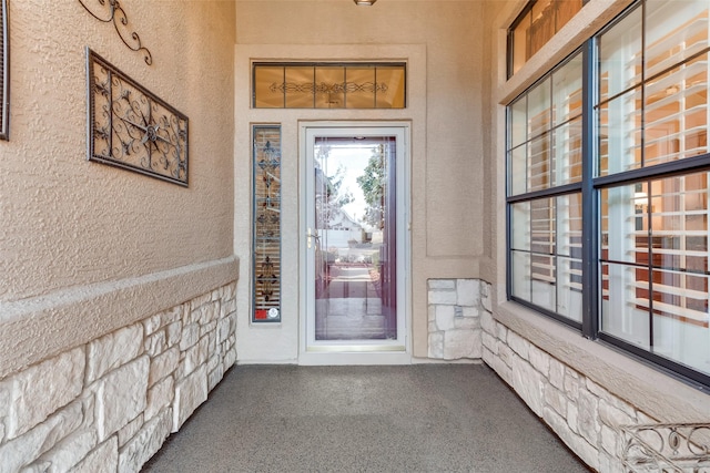 10104 Southpoint Ct, Denton, TX 76207 - view of exterior entry with stucco siding and stone siding