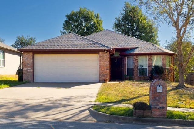 ranch-style home featuring a garage