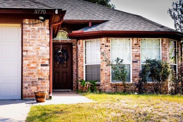 entrance to property with a garage