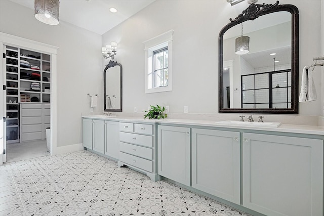 bathroom with vanity and an enclosed shower