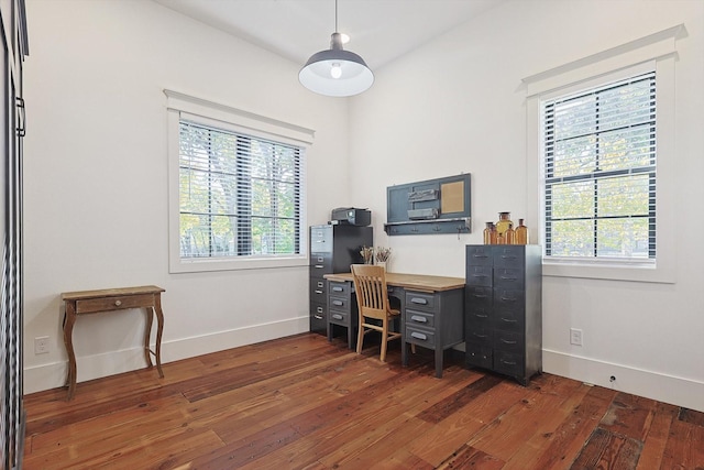 office area featuring plenty of natural light and dark hardwood / wood-style floors