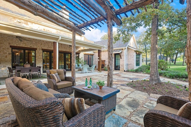 view of patio with a pergola and outdoor lounge area