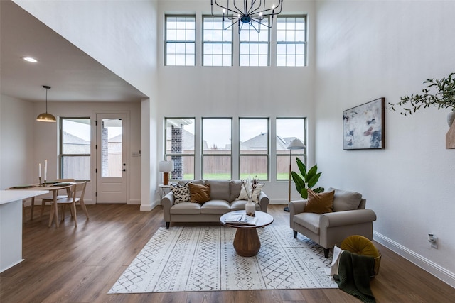 living room featuring a healthy amount of sunlight and wood finished floors