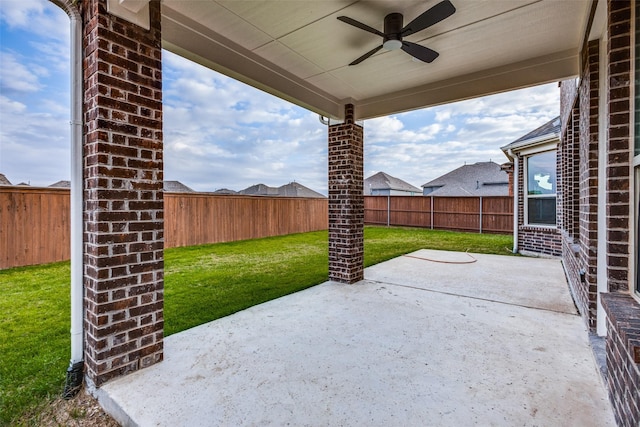 view of patio / terrace with a fenced backyard and ceiling fan