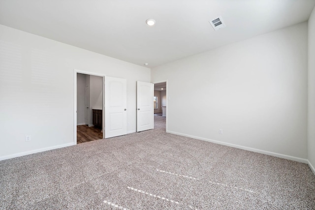 unfurnished bedroom featuring carpet flooring