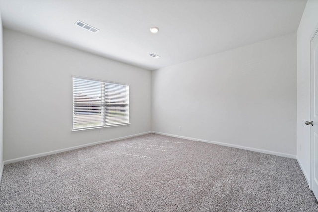 empty room with carpet floors