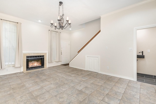 unfurnished living room featuring ornamental molding and a chandelier