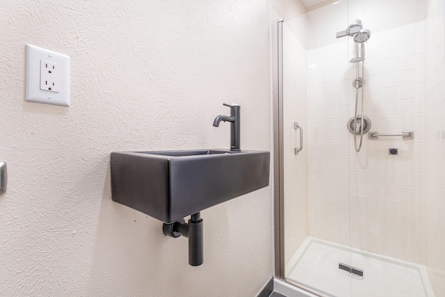 bathroom with an enclosed shower