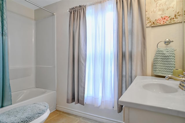 bathroom with tile patterned floors, vanity, and shower / bath combination with curtain