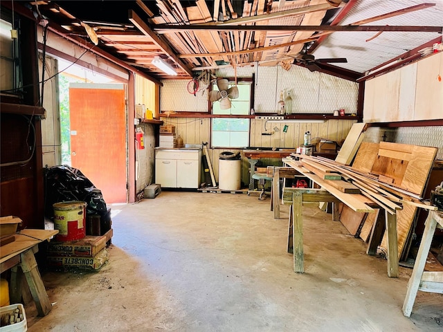 1721 Cooper Dr, Irving, TX 75061 - basement with a ceiling fan and a workshop area