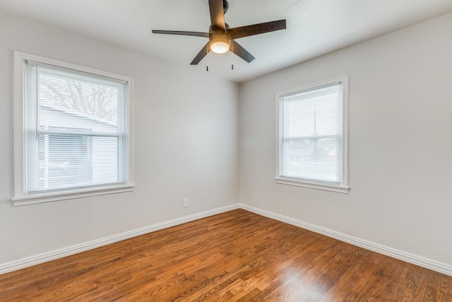 unfurnished room featuring ceiling fan and wood-type flooring