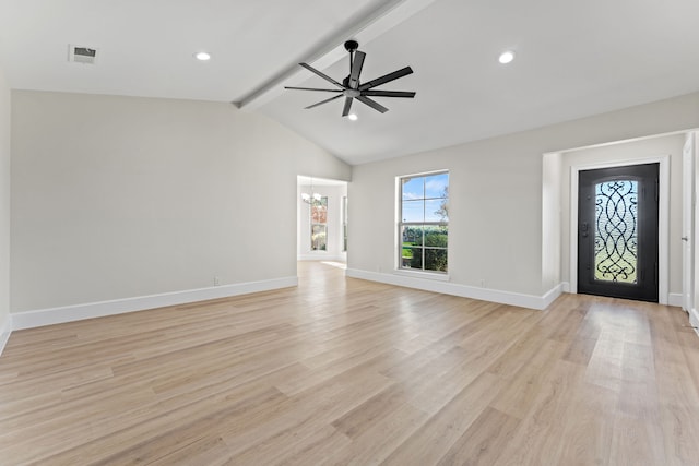 entryway with lofted ceiling with beams, ceiling fan with notable chandelier, and light hardwood / wood-style flooring