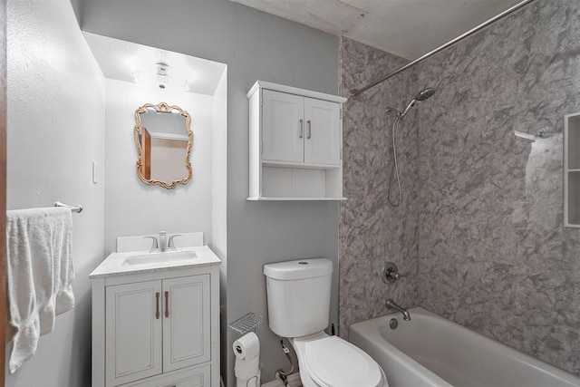 full bathroom with toilet, vanity, and tiled shower / bath combo