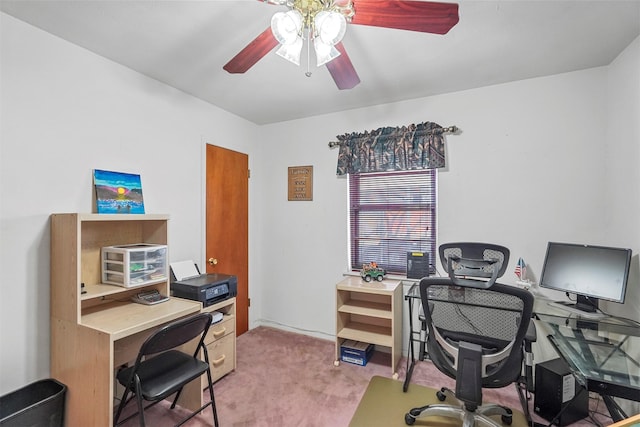 office area with ceiling fan and carpet flooring