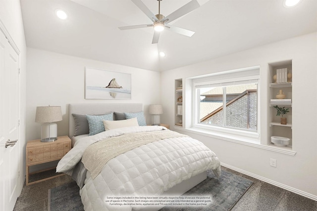 carpeted bedroom featuring lofted ceiling and ceiling fan