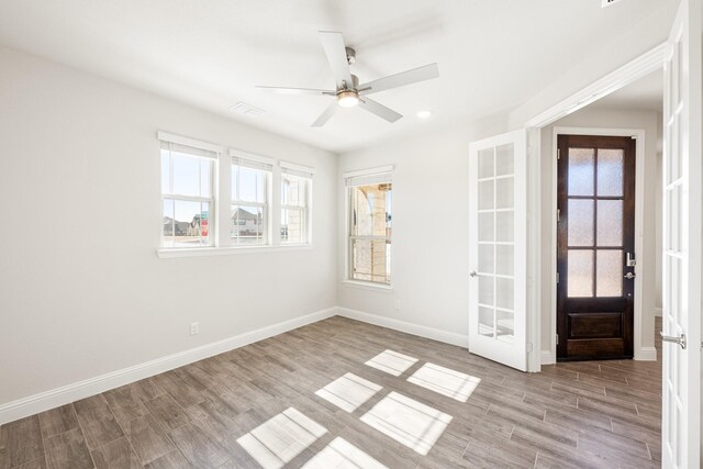 dining space featuring a chandelier and wood-type flooring