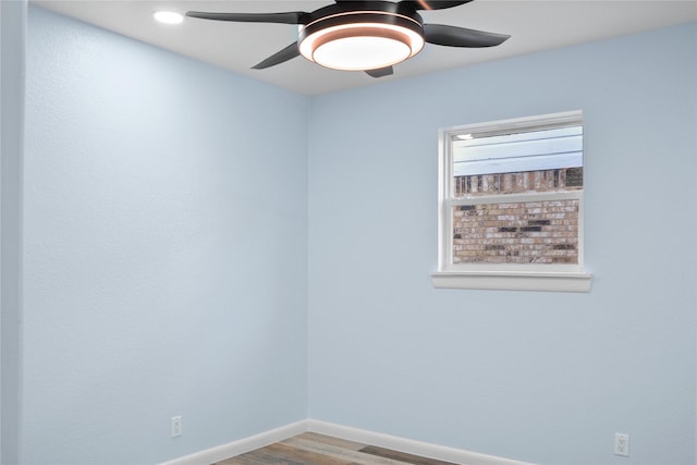 empty room featuring light hardwood / wood-style floors and ceiling fan