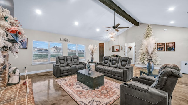 living room featuring high vaulted ceiling, ceiling fan, beamed ceiling, and concrete flooring