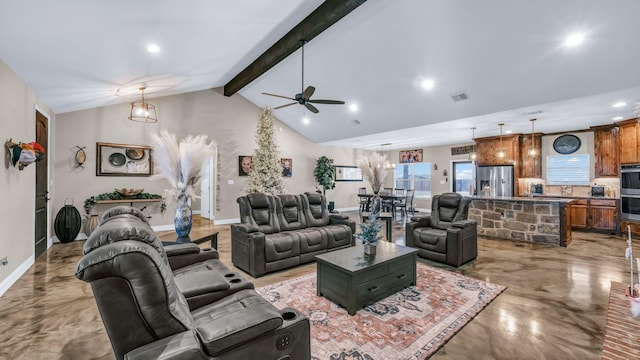 living room featuring ceiling fan with notable chandelier and lofted ceiling with beams