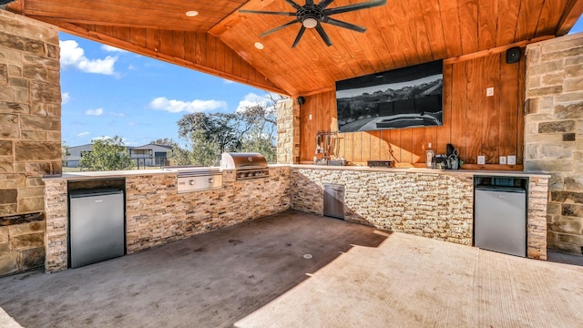 view of patio featuring ceiling fan, a grill, and area for grilling