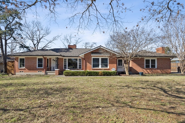 single story home with a front lawn