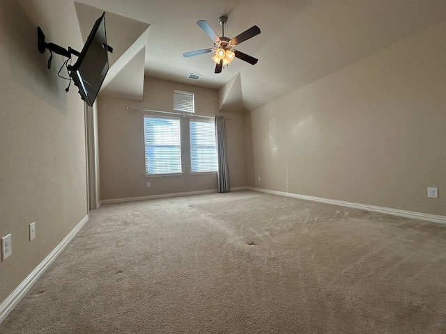 unfurnished room with carpet floors, ceiling fan, and lofted ceiling