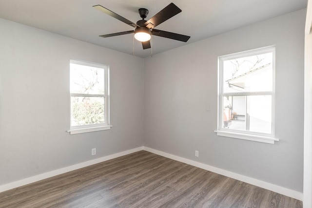 unfurnished room featuring hardwood / wood-style floors and ceiling fan