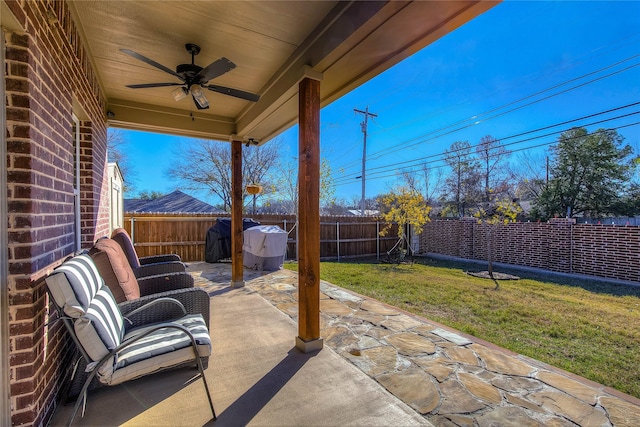 view of patio with ceiling fan