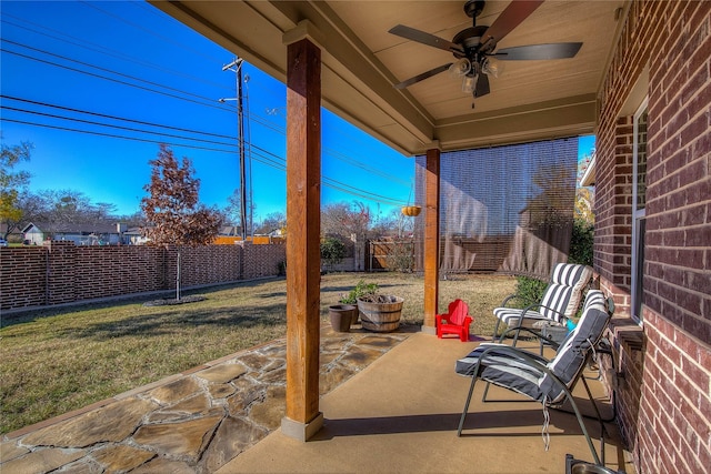 view of patio featuring ceiling fan