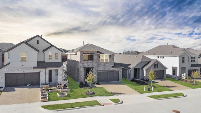 view of front facade with a garage and a front lawn