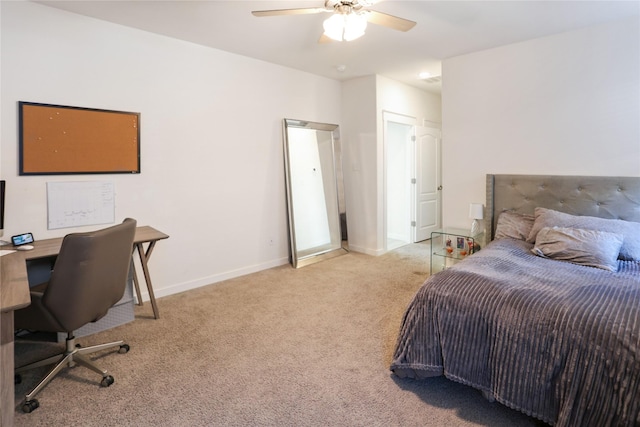 bedroom featuring light carpet and ceiling fan