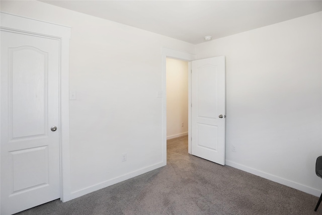 unfurnished bedroom featuring carpet flooring