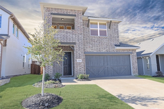 view of property with a garage and a lawn