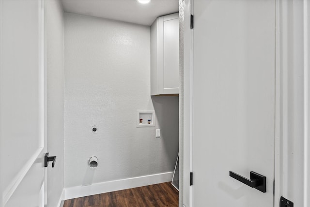 laundry room featuring hookup for an electric dryer, dark hardwood / wood-style flooring, cabinets, and hookup for a washing machine