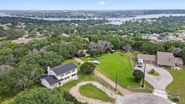 bird's eye view with a water view