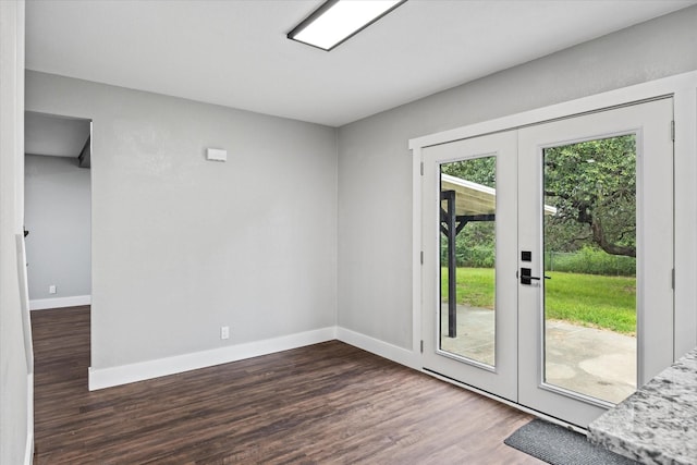 doorway to outside with french doors and dark wood-type flooring