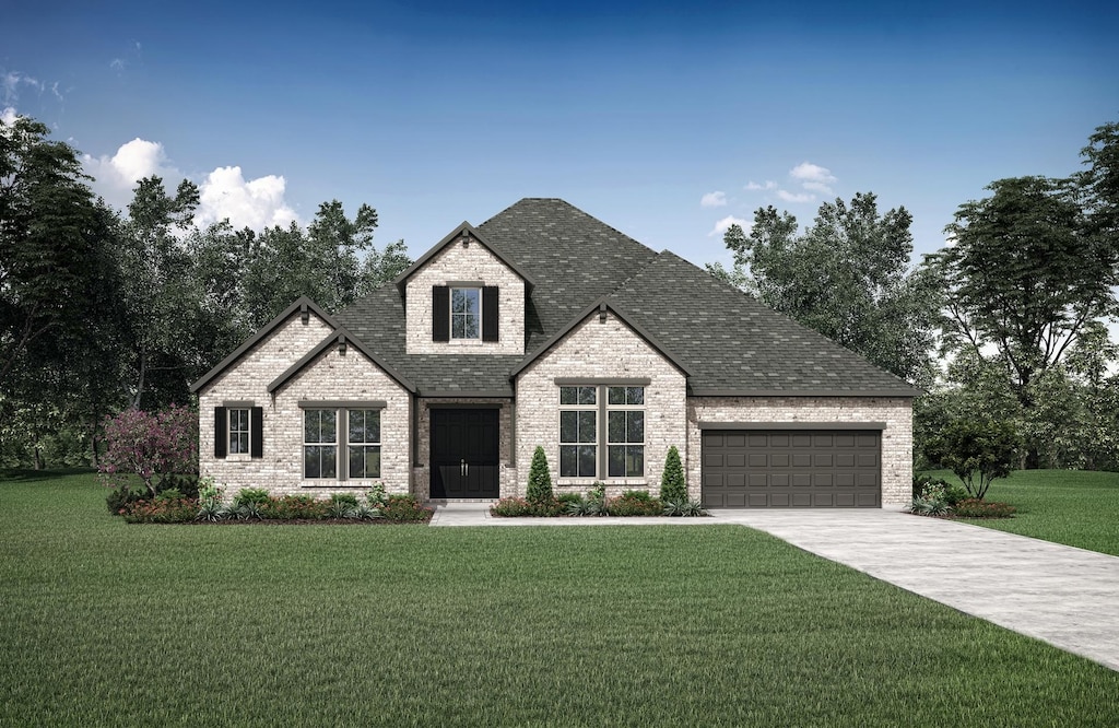 view of front facade featuring a front lawn and a garage