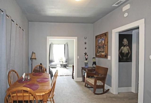 view of carpeted dining room