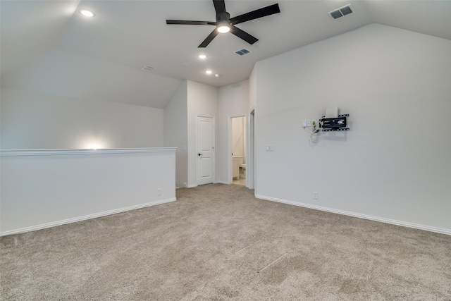 bonus room featuring carpet, baseboards, visible vents, and vaulted ceiling