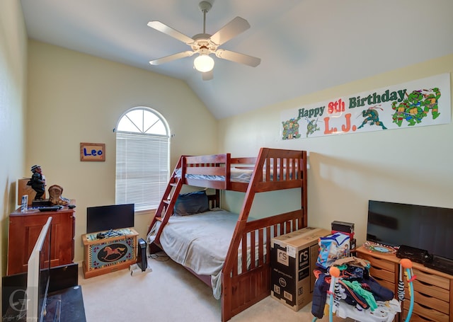 bedroom with lofted ceiling, carpet floors, and ceiling fan