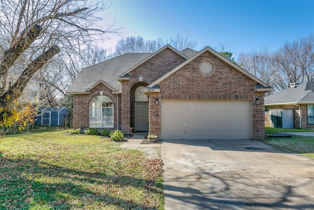 front facade with a garage and a front lawn