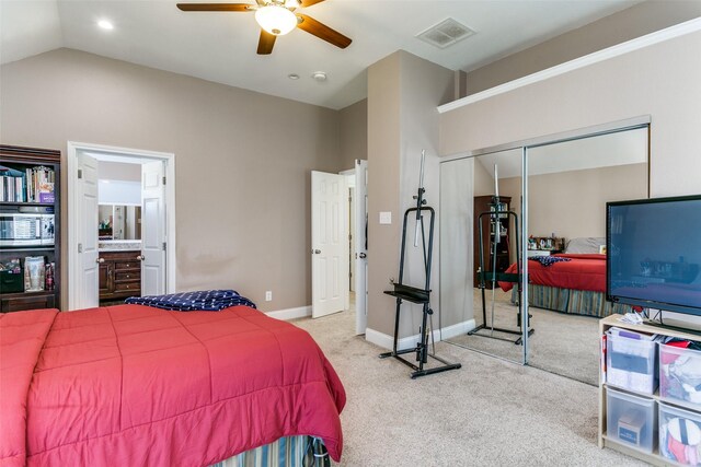 carpeted bedroom featuring vaulted ceiling and multiple windows